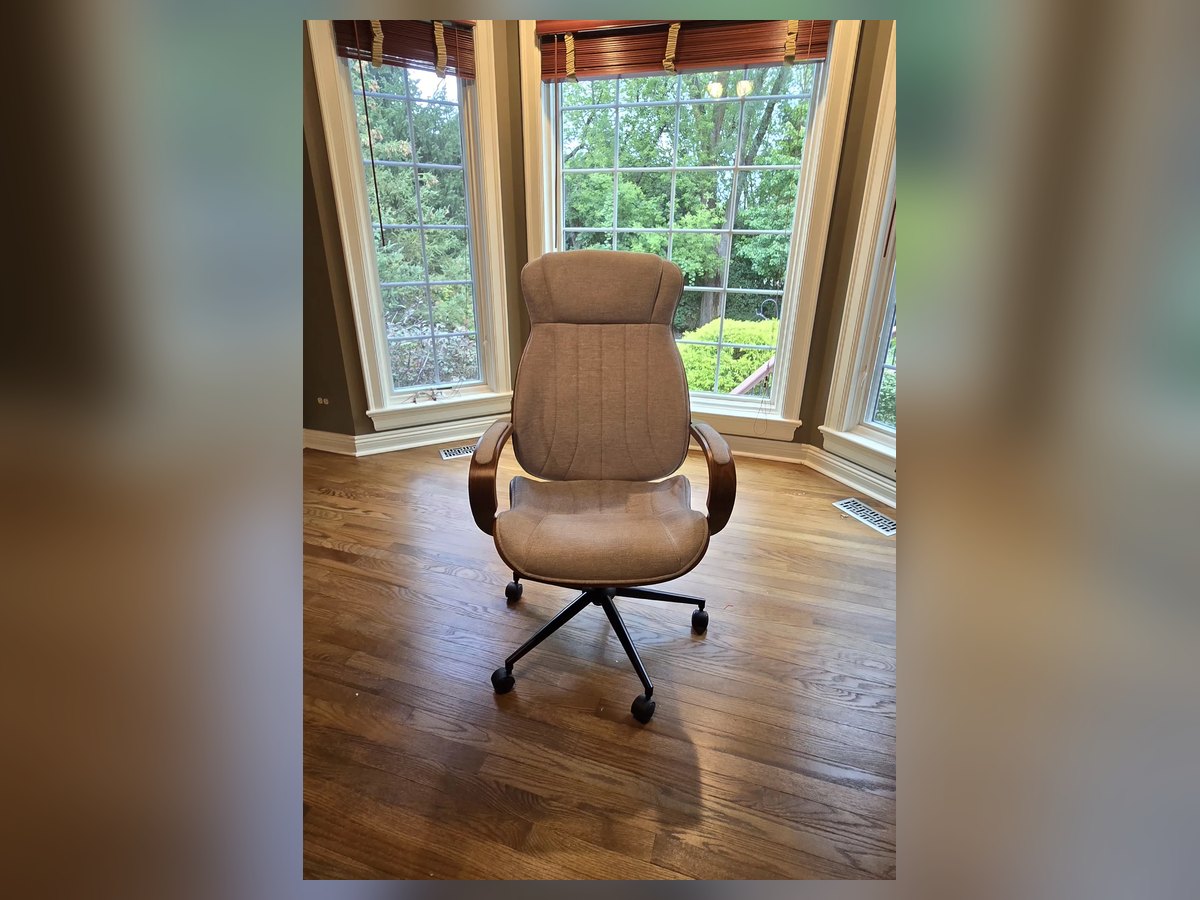 Executive office chair assembled in a bay window room