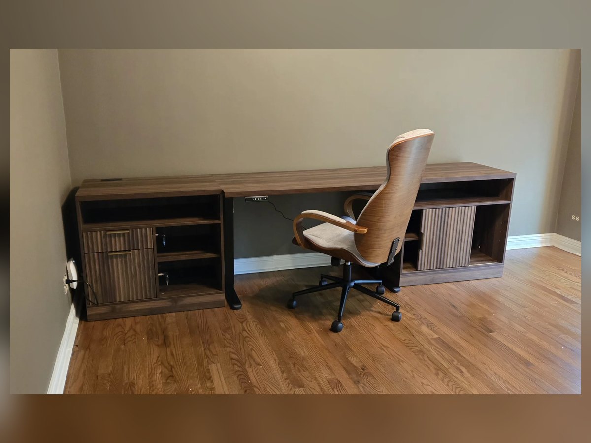Assembled home office desk with executive chair